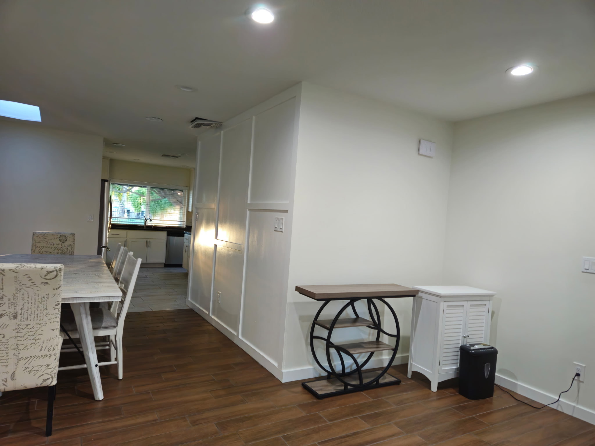 Clean dining area with hardwood floors