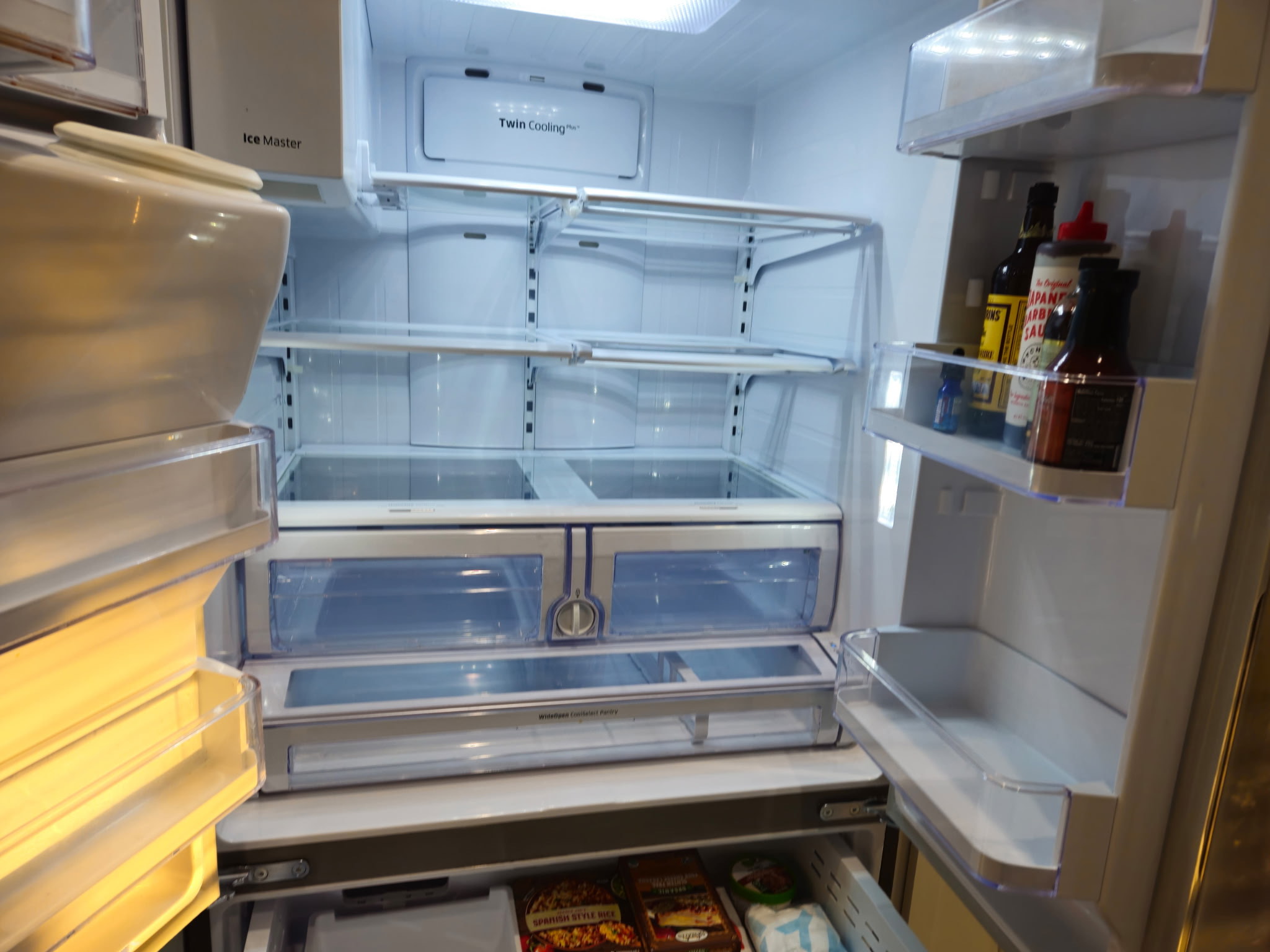 Immaculate refrigerator interior with clean shelves